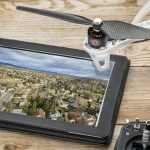 reviewing aerial pictures of residential areas